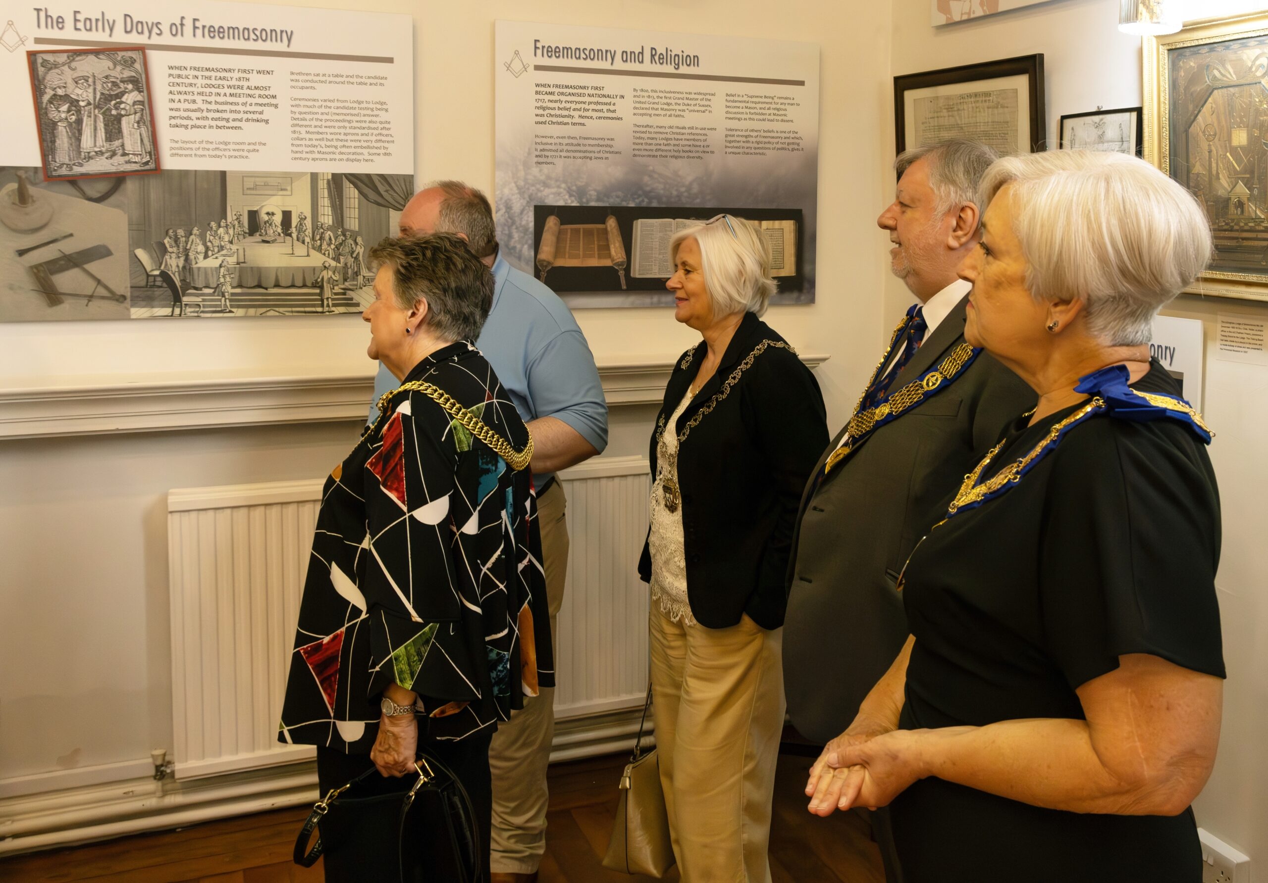 The Lord Mayor and Lady Mayoress of Canterbury, with Philip South (Deputy Grand Master of East Kent, UGLE) and Jacqueline Langdon-Bassett (Grand Inspector for East Kent, OWF), being shown exhibits by Richard White (Trustee, and Secretary of the Trust).
